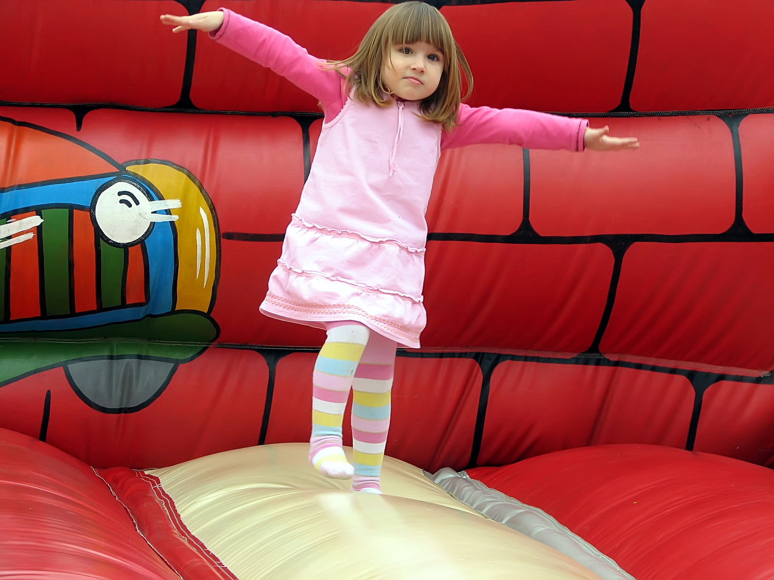 Girl on bouncy castle
