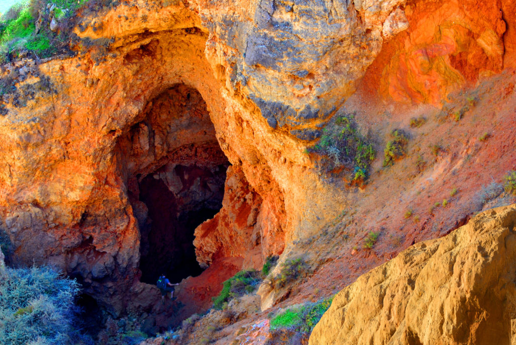 Ponta Da Piedade, Algarve, Portugal - October 28, 2015 : Climber exploring Ponta Da Piedade spectacular rock formations