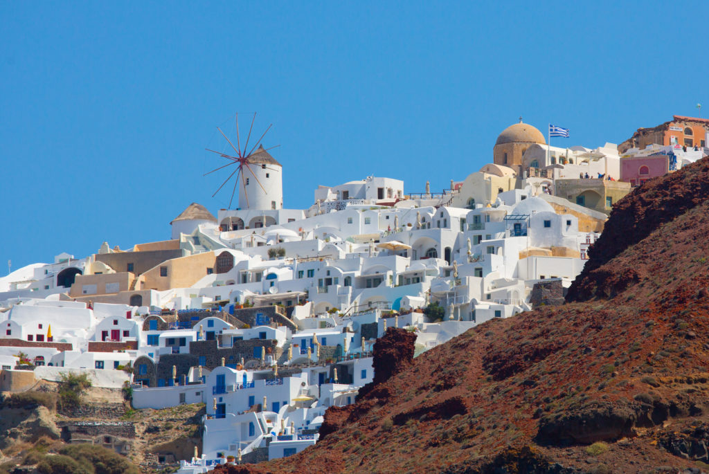 Oia Village, perched on clifftop.