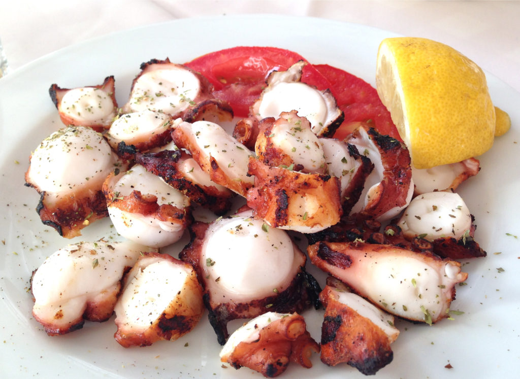 Grilled Octopus with lemon and tomato