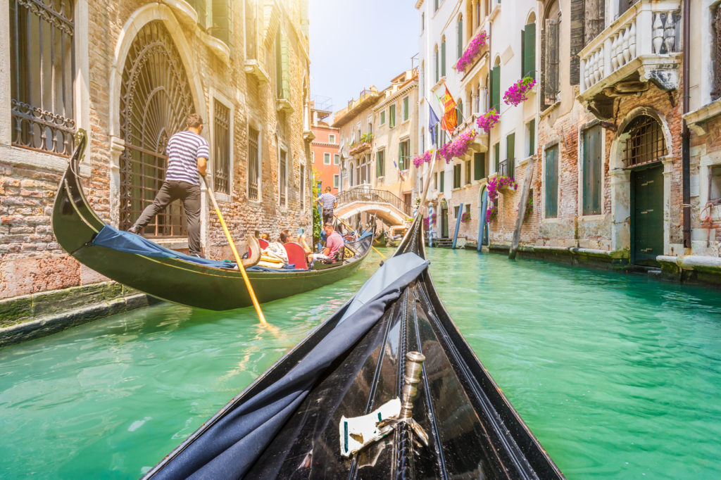 Gondola ride through the canals of Venice, Italy