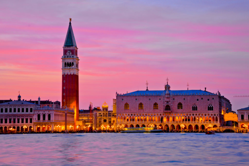 Doge's Palace and St Mark's Campanile in Venice, Italy, at sunset