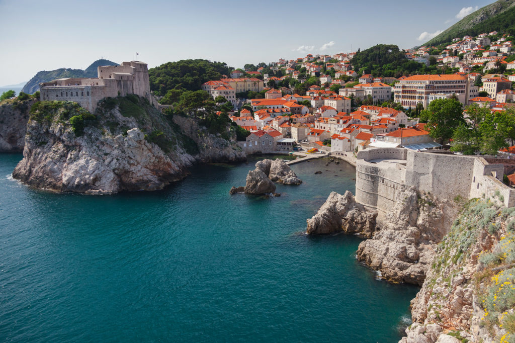 DUBROVNIK, CROATIA - MAY 26, 2014: View on Lovrijenac fort, city and city walls. Lovrijenac is known as Dubrovnik's Gibraltar and it had prime importance for the defense of western part of city.