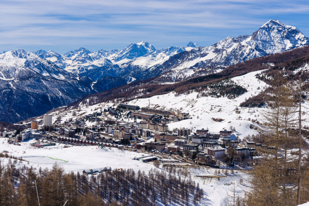 View over the snow-clad slopes of Sestriere in the Milky Way ski resort in Piedmont.