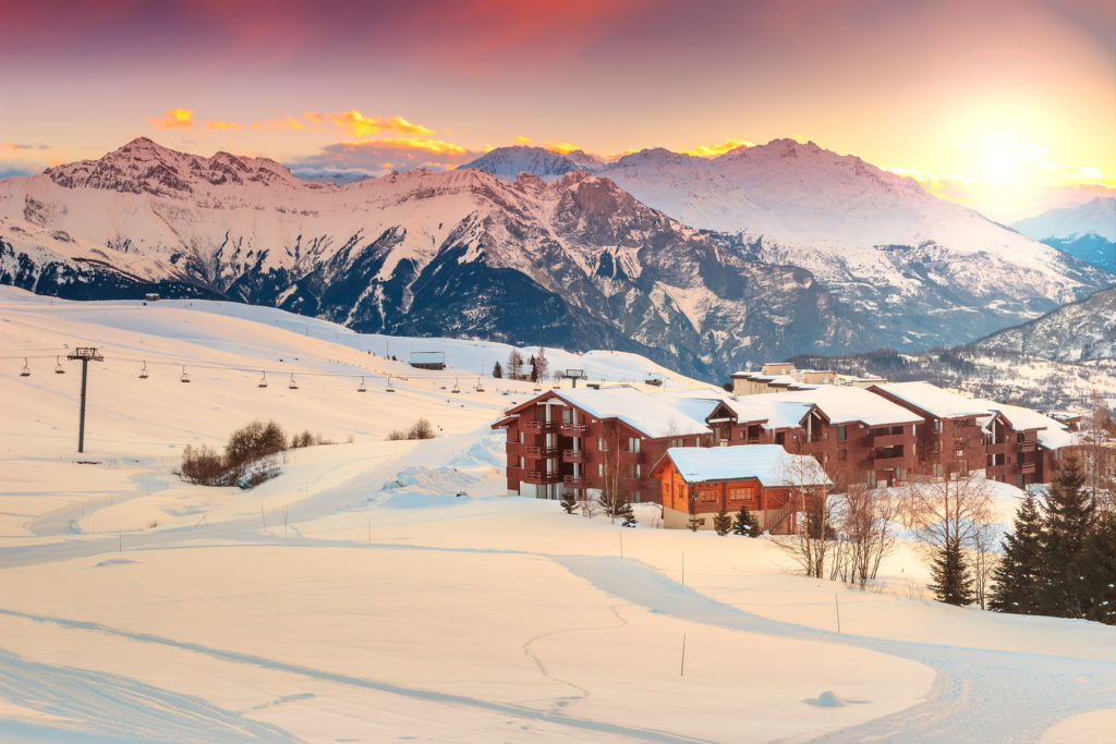 Majestic winter sunrise landscape and ski resort in French Alps,La Toussuire,France,Europe