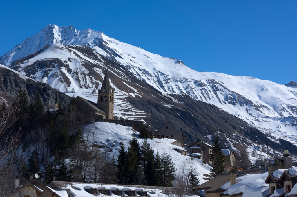 Mountains and church of Notre-Dame in La Grave, France