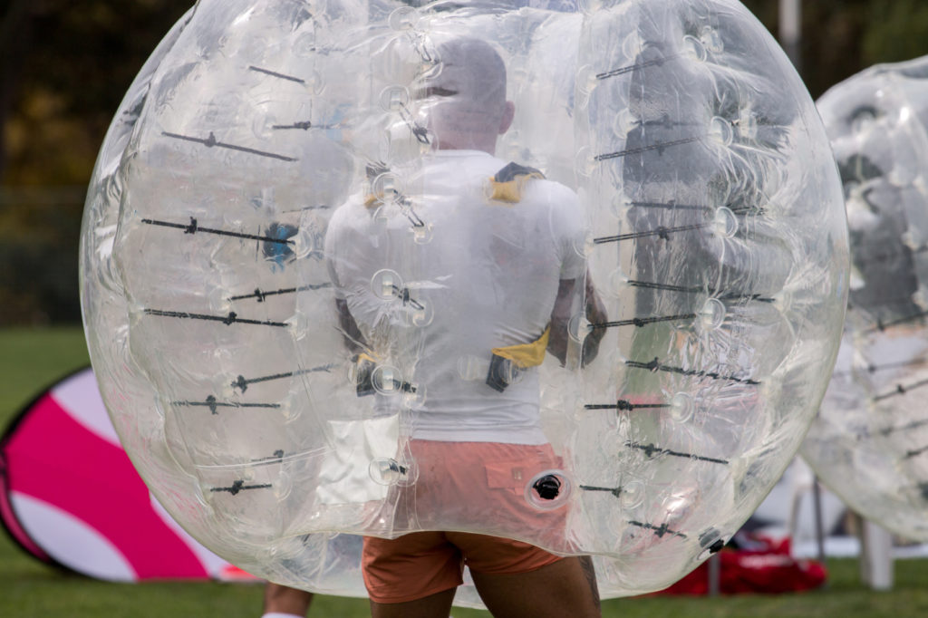 Close up view of bubble football balls game.