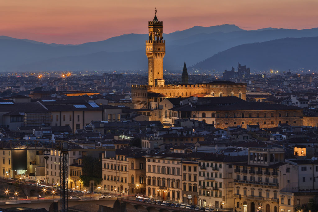 The Palazzo Vecchio and the city of Florence at night - viewed from Piazzale Michelangelo. In 1982, the historic centre of Florence was declared a UNESCO World Heritage Site