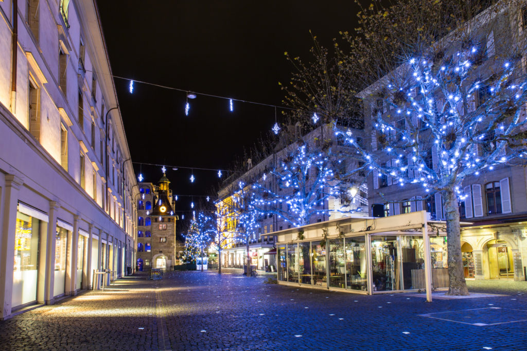 Geneva, Switzerland - December 13, 2014: The Molard square at night illuminated by Christmas decorations, in downtown Geneva.