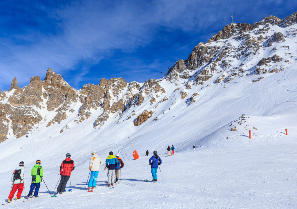 Skiers on the slopes of the ski resort of Meribel, France